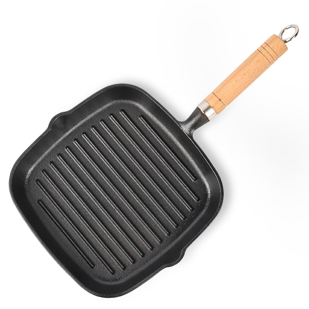 Parrilla de hierro fundido antiadherente de 9,25 pulgadas con mango de madera para cocinar en interiores y exteriores.