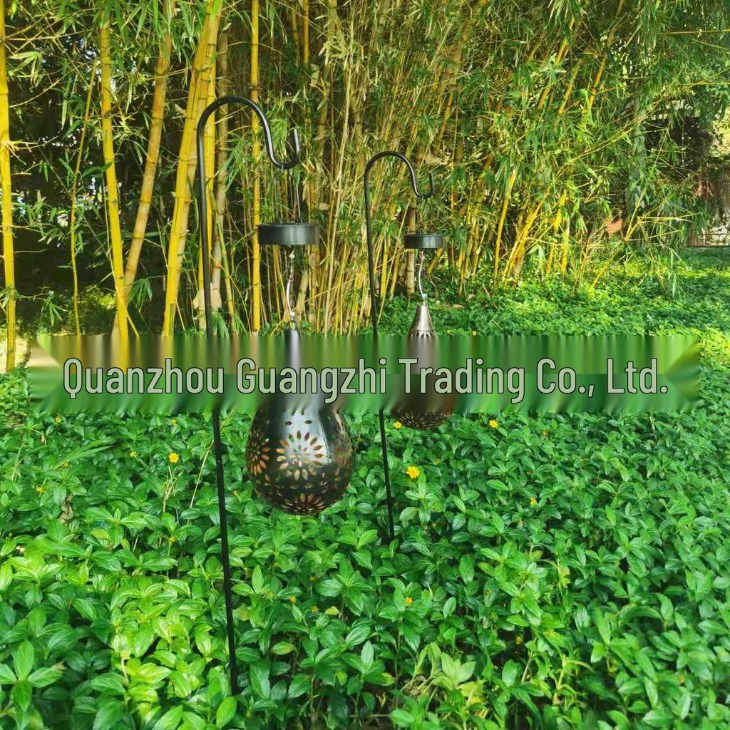 Cross-Border Iron Art Solar Lamp: Hollow Outdoor Courtyard Lawn Projection Light in Water Drop Shape