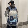 Stylish and Exquisite Contrasting Color Badge Large-capacity Backpack 24 New Primary School Junior High School Boys and Girls Schoolbag