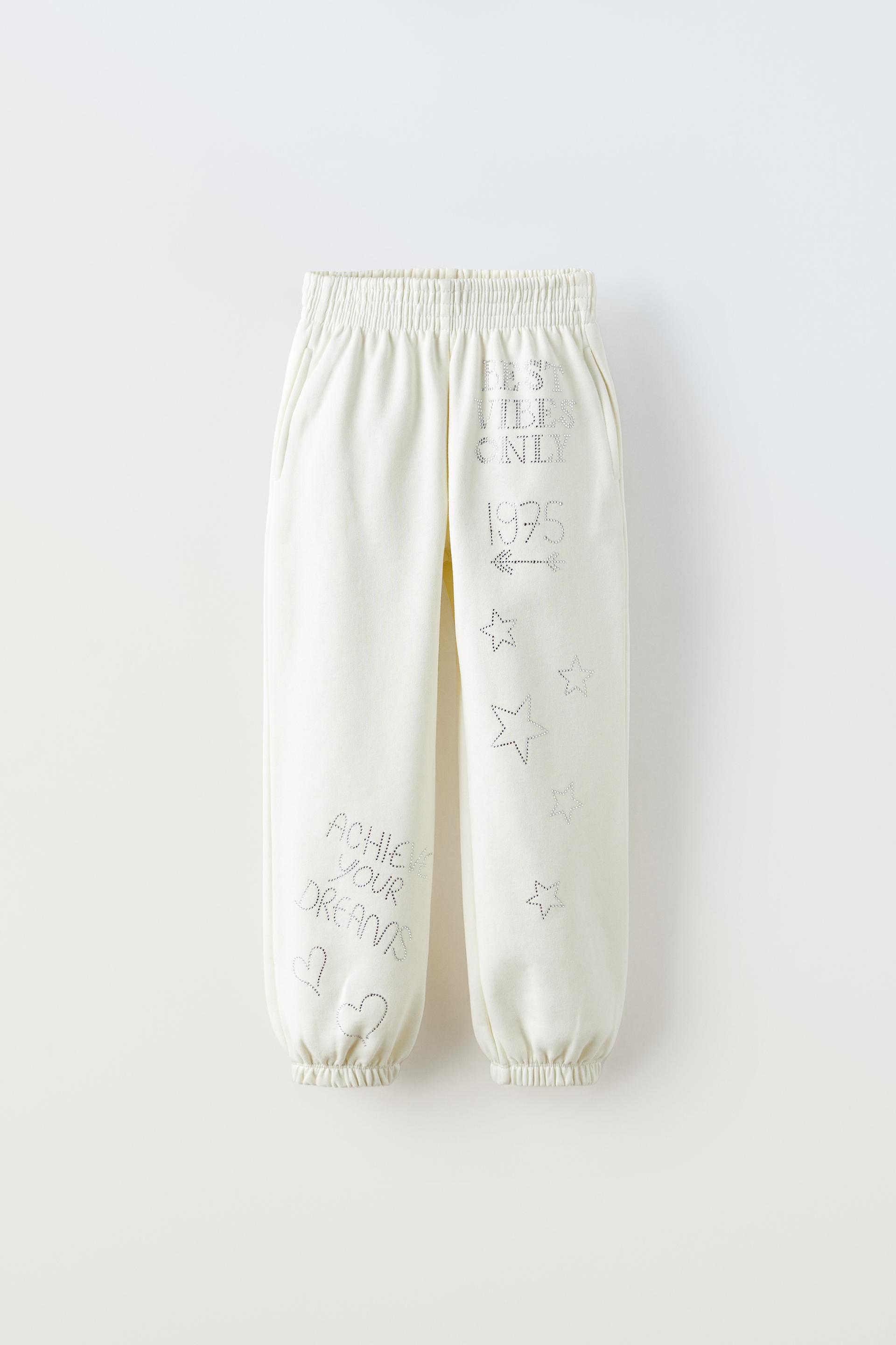 

БРЮКИ-ДЖОГГЕРЫ СО СТРАЗАМИ