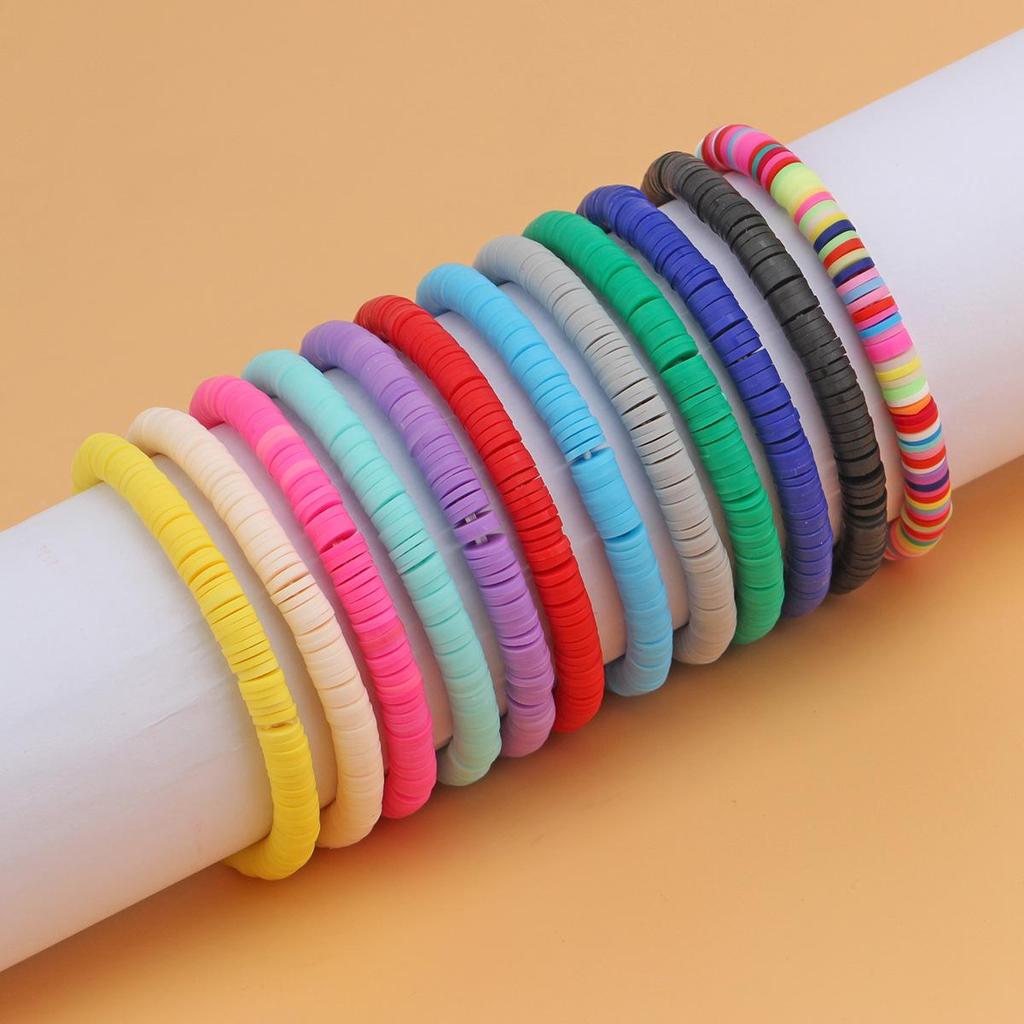 Taylor Swift Friendship Bracelet: Pink Letters Inspired by Lover, Fearless, Anti-Hero, 1989, and Reputation.
