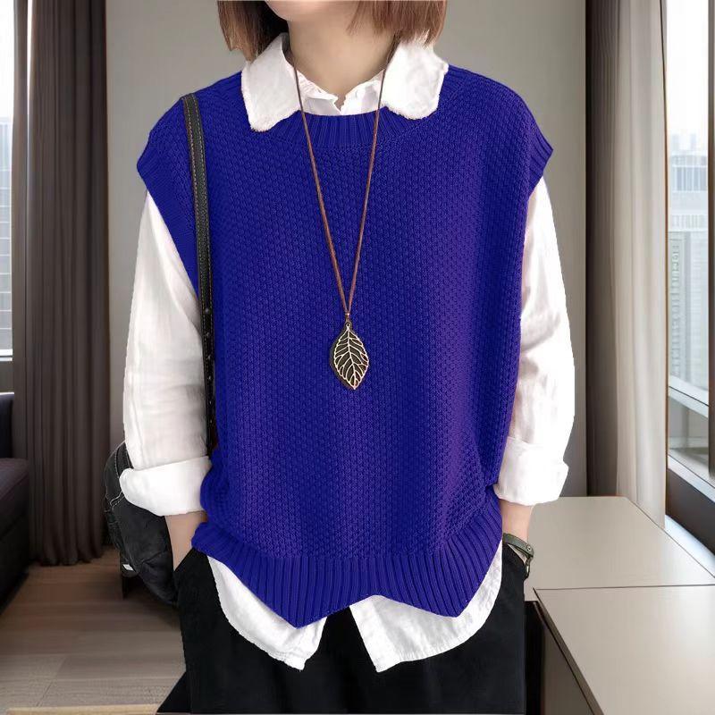 

Жіночий повсякденний в язаний жилет вільного крою з хвилястим подолом та круглим вирізом синій