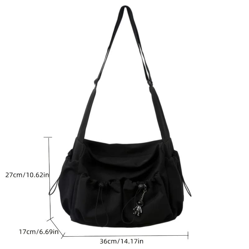 Fashionable Crossbody Bag with Drawstring Accent - Spacious & Secure Zipper Closure - Includes Stylish Bag Charm