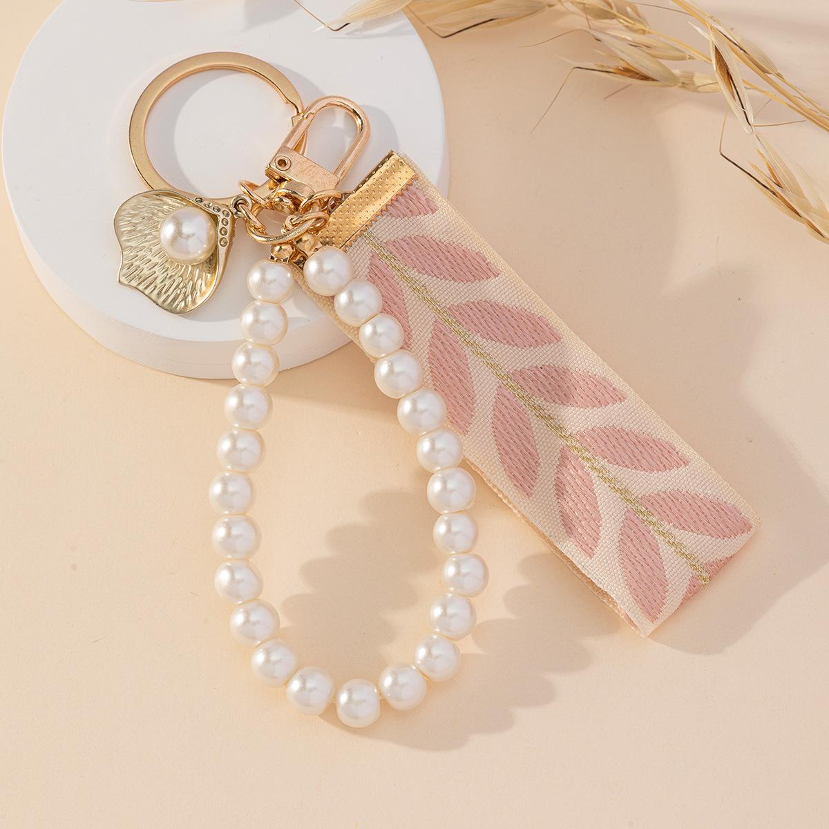 

Милый брелок с искусственным жемчугом и листиком, женский аксессуар для сумки или чехла розовый