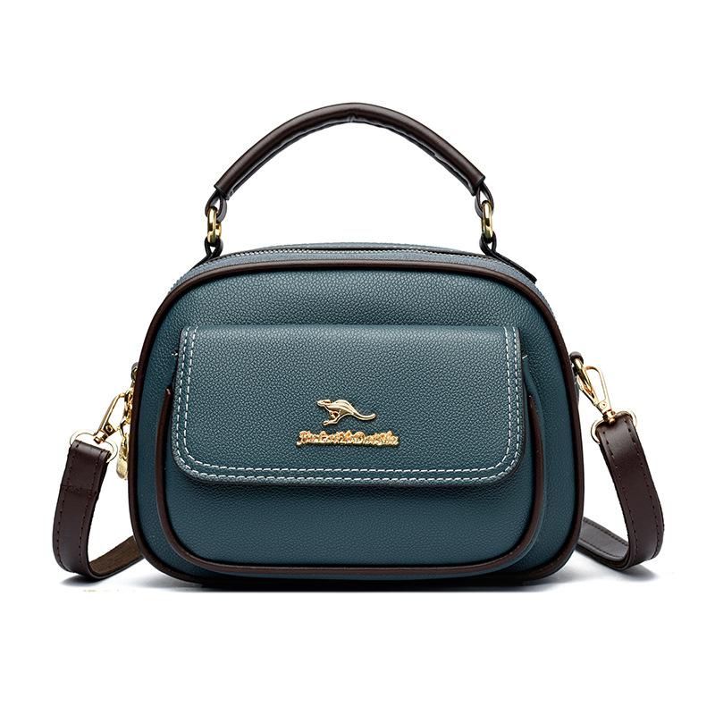 

Ole US soft leather women s bag 2025 new fashionable atmospheric handbag middle-aged women s mother gift messenger bag синий