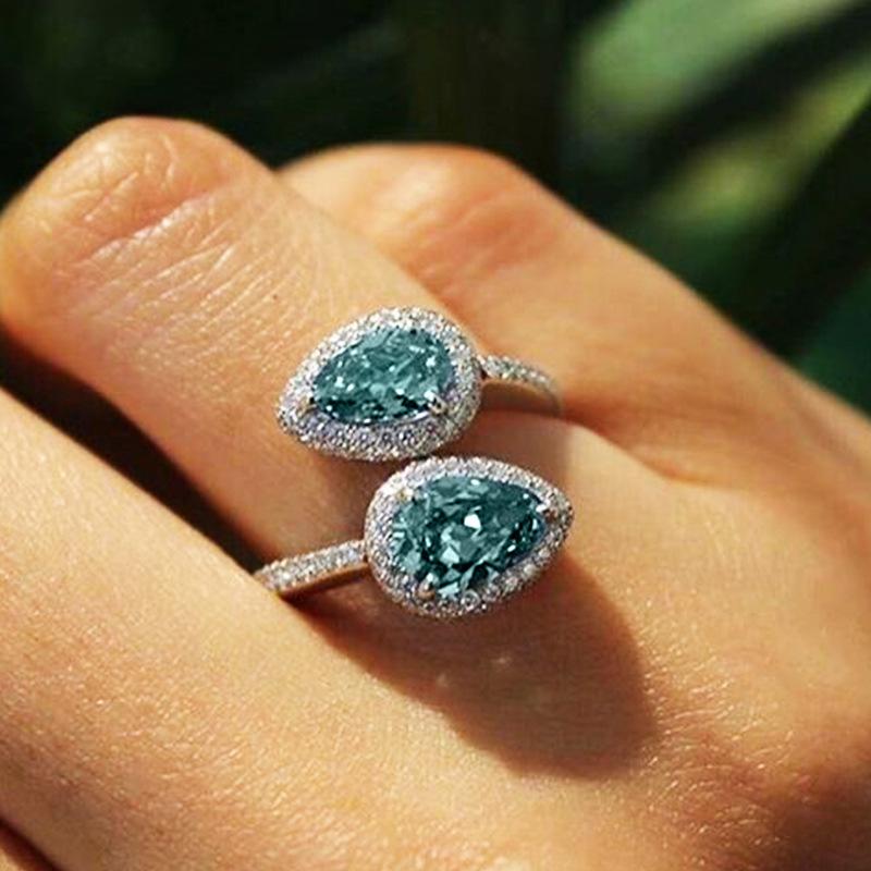 Elegant Teardrop Crossover Ring with Two Teal CZ Stones and Micro-Paved Halo Silver Tone Adjustable Cocktail Ring Adjustable opening