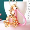 Elegant Pumpkin Car Charm Keychain Accessory For Women With Metallic Finish And Colorful Ropes Ideal For Gifts And Special Occasions