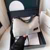Niche design bag women's bag large capacity messenger bag knitted cloth shoulder armpit bag