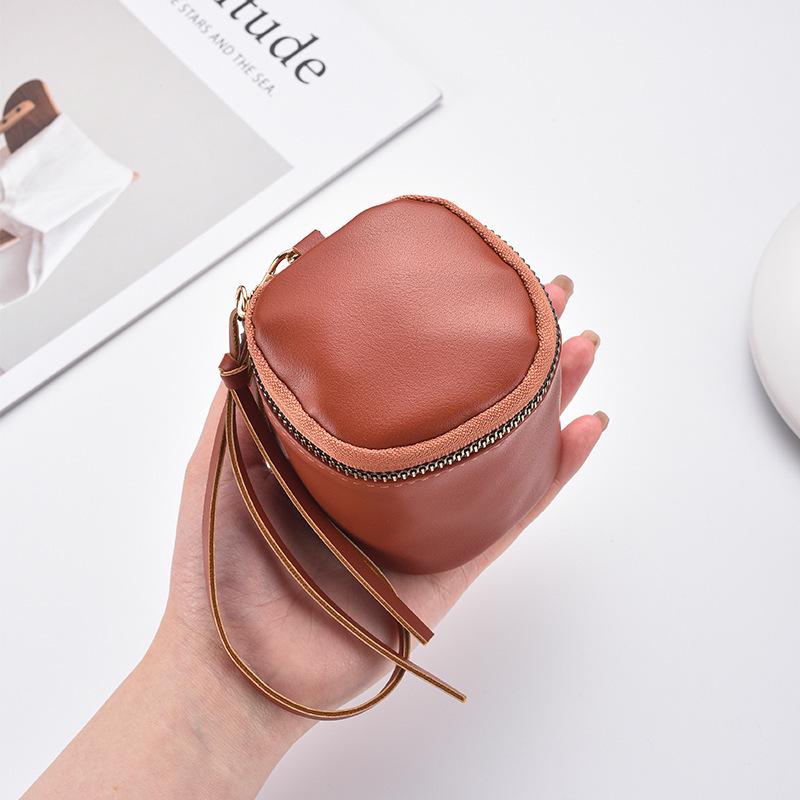 Retro Handheld Coin Purse with Wenge Beads, Flocked Leather Mini Key Holder, and Large Capacity Earphone Pocket Envelope.
