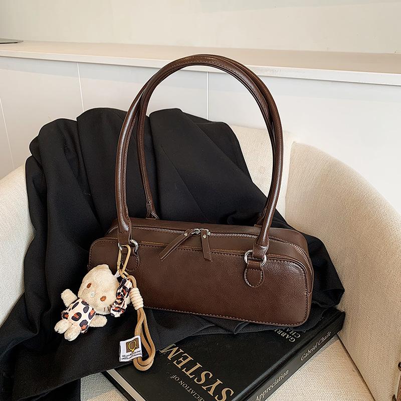 

Сумка женская сумка через плечо иностранная текстурированная сумка подмышкой модная сумка-багет женская ручная большая сумка no pendant темно-коричневого