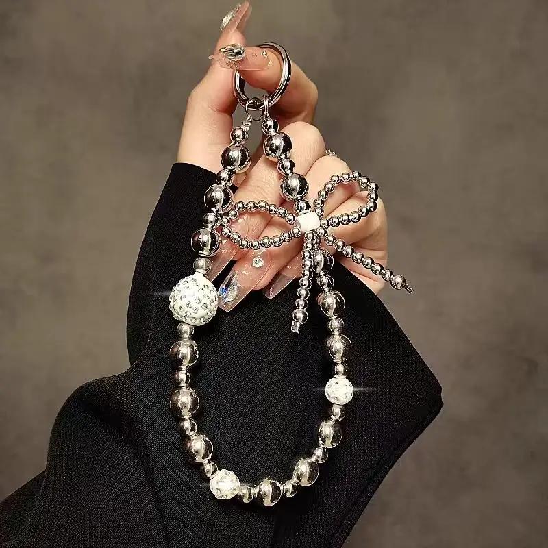 

Sparkling Diamond Silver Bead Bow Bracelet Suitable for All Phone Case Models Premium Handheld Chain Wristband Women s Anti Loss