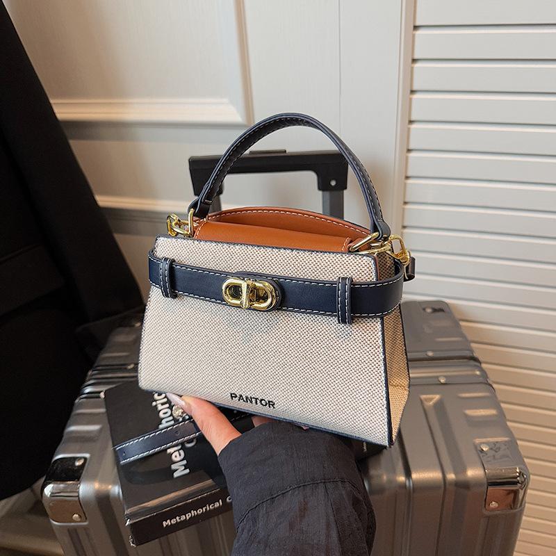 

Commuter large-capacity canvas bag women s 2025 new popular and popular versatile messenger bag fashion contrasting handbag