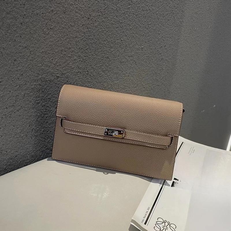New lychee pattern leather half cover hand grab bag genuine leather women's bag single shoulder underarm bag oblique span bag wholesale