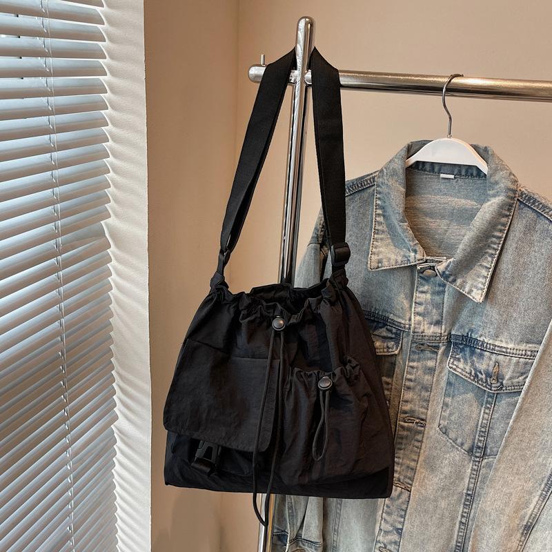 Cloth bag women's large-capacity new summer leisure niche drawstring single shoulder crossbody commuter tote bag