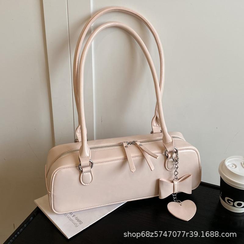 High-end texture foreign style small bag women's 2025 new versatile one-shoulder armpit bag French niche design baguette bag