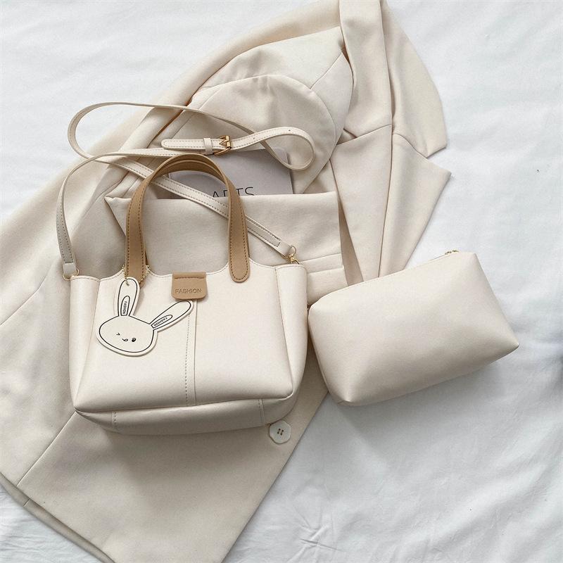 

2025 лето новая мода простой большая вместимость портативная сумка-ведро ощущение зарубежного маленькая сумка женская плечевая сумка мессенджер