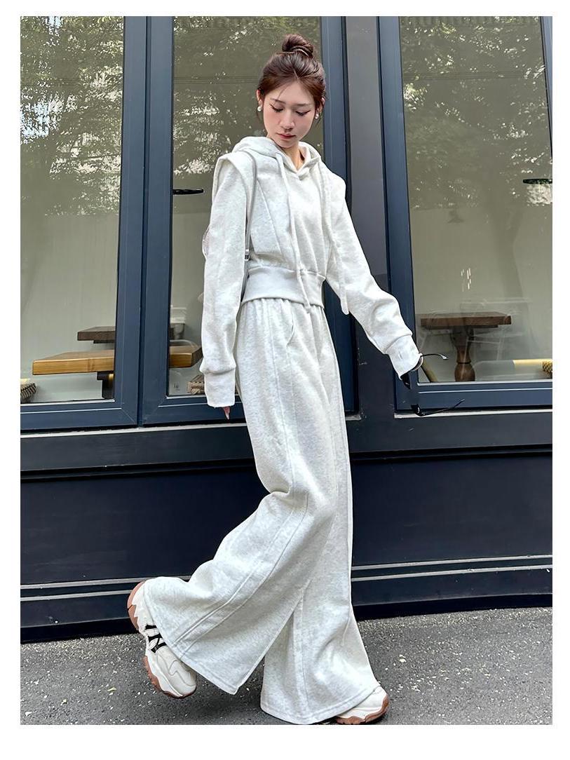 

Женский комплект из двух предметов: худи свободного кроя и брюки палаццо - осенне-зимний стиль XX-Large