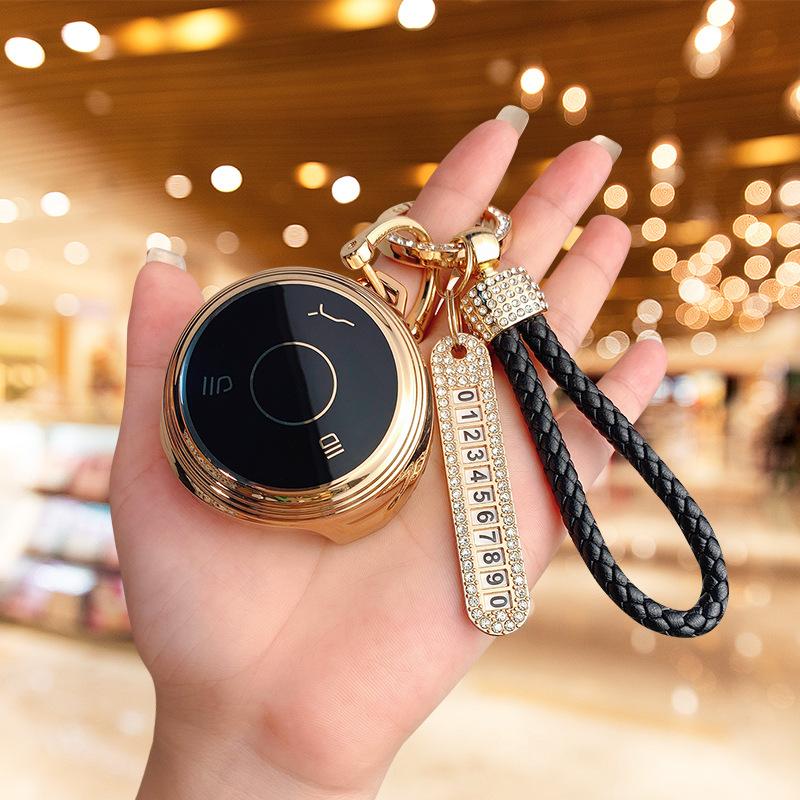 Applicable to Nezha V car Nezha U Pro key set bag, high-end protection, anti-drop personalized buckle, men's and women's new energy shell