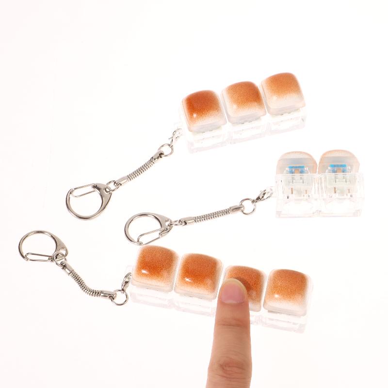 Kreatives Brot Tastatur Schlüsselanhänger Mechanische Tastatur Dekompression Spielzeug Schlüsselring Tasche Anhänger Fidget Knopf Finger Spielzeug
