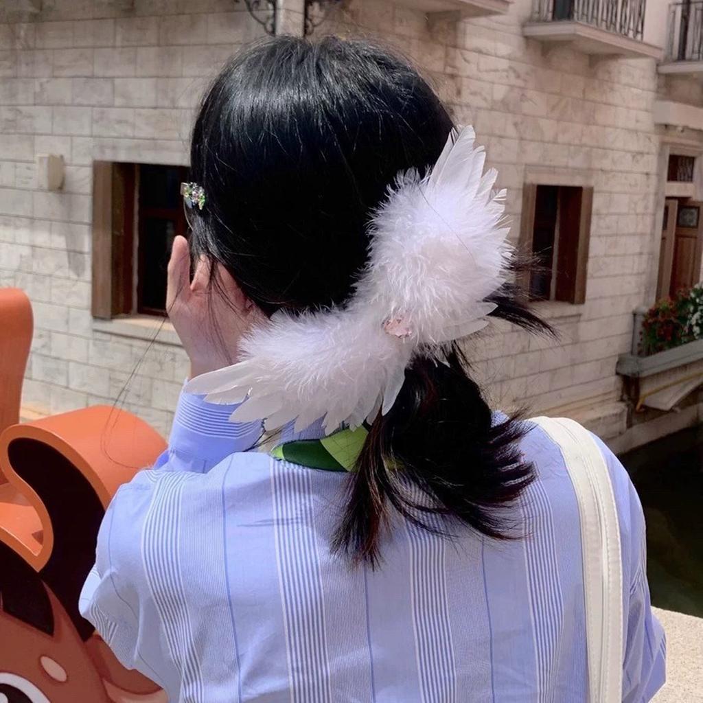 Fashionable Black And White Feathered Hair Accessory Featuring Wing Designs And Rhinestones For Young Women At Parties