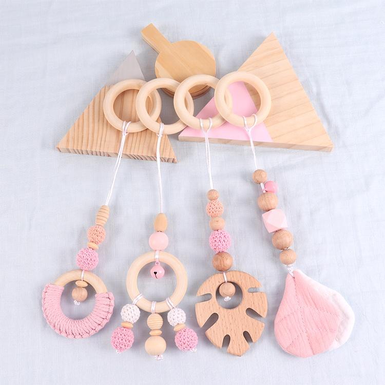 China Manufacturer Exquisite Color Leaf Four-piece Fitness Rack Pendant Wooden Baby Play Activity Gym