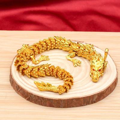 Goldene bewegliche Drachenornamente – Handgehaltene Sammlerstücke und Kunsthandwerksgeschenke mit dem Sternzeichen Drache