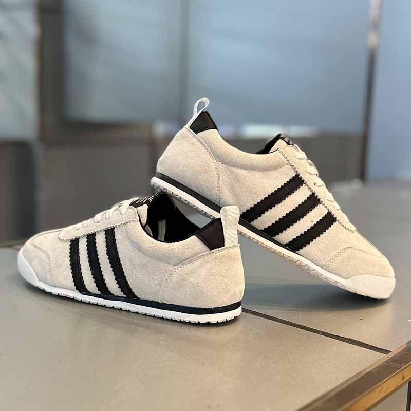 Sportovní a volnočasová obuv jarní a podzimní elastická jarní a podzimní trendy pánská obuv pro volný čas sportovní desková obuv pánská obuv všestranná, protiskluzová