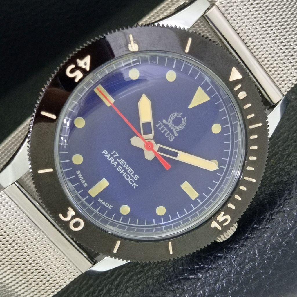 

ШВЕЙЦАРСКИЕ МУЖСКИЕ ВИНТАЖНЫЕ ЧАСЫ TITUS С РУЧНЫМ ЗАВОДОМ, ВРАЩАЮЩИМСЯ БЕЗЕЛЕМ, СИНИМ ЦИФЕРБЛАТОМ a700022-5 R201-a700022