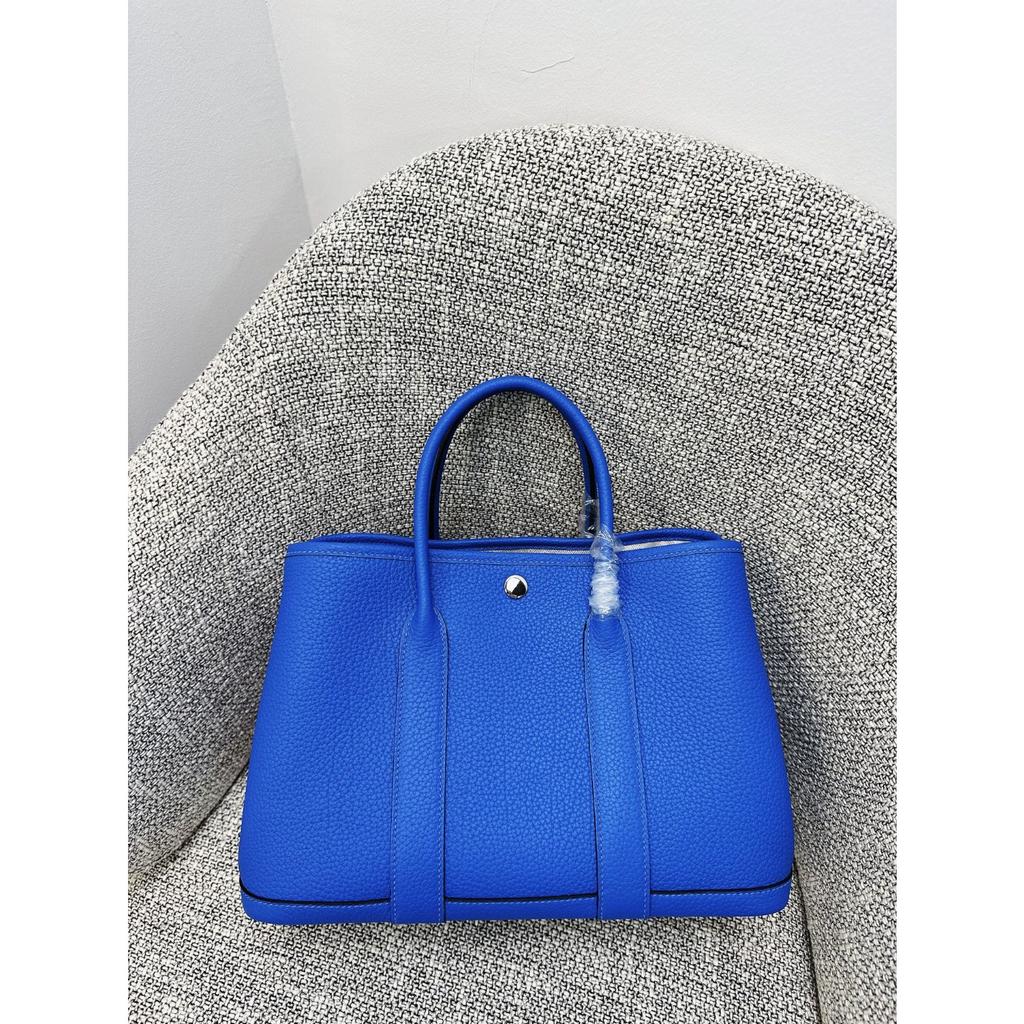 Borsa da giardino cucita a mano con filo cerato, ferramenta interamente in acciaio, borsa da donna portatile in pelle bovina primo strato con motivo a collo di mucca Ntogo