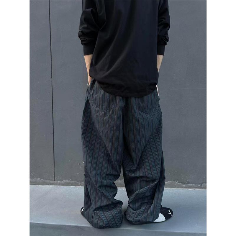 Amerikanische Retro-Schwarze und Blaue Vertikal gestreifte Säbel-Weitbeinige Hosen Herren und Damen Lässiges Lockeres Design Kann an den Füßen gebunden werden Bodenwischende Hosen