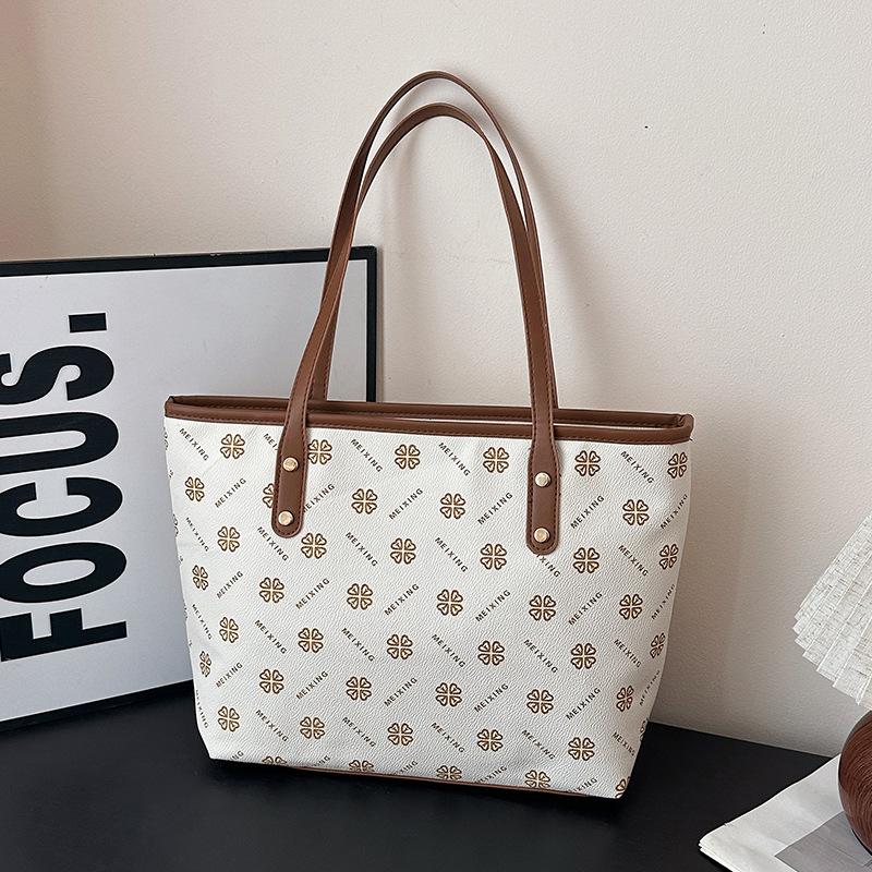 New Printed Women's Fashion Handbag, Textured Large-capacity Commuter Bag, Women's Textured Armpit Large Tote Bag