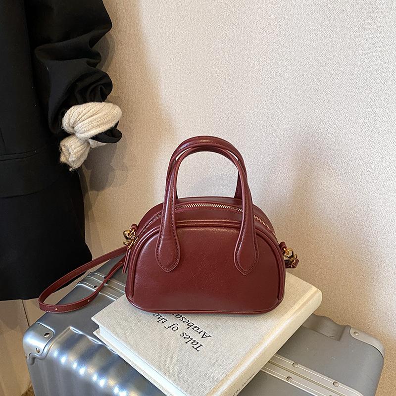 Mode handburen kuddeväska dam 2025 ny avslappnad mjuk läder axel skalväska trendig budväska