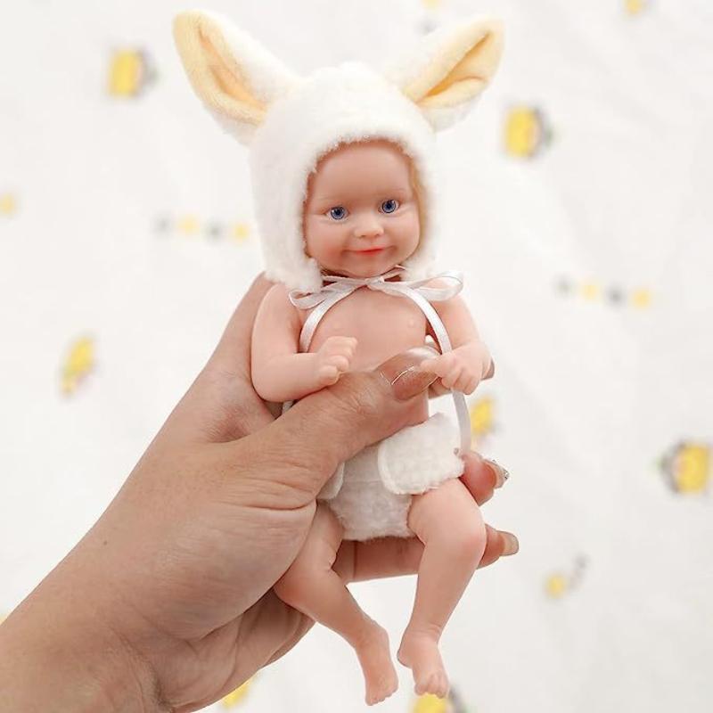 Bambola Reborn in silicone solido da 6 pollici con corpo intero per ragazza e ragazzo Mini bambola di simulazione palmo da 15 cm Maddie Dress Up Playmate Toy Doll Regalo di compleanno per bambini