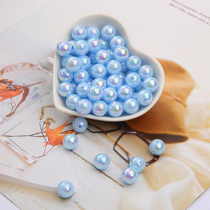 

Акрилові круглі намистини кольору AB зі штучною перлиною для ювелірних браслетів своїми руками Diameter 6mm, 100 pieces/pack світло-синій колір