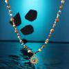 Ethnic Style Vintage Gold Necklace with Beaded Sun Pendant and Tiger Eye Stone
