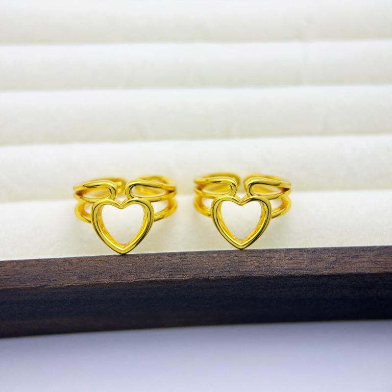 Exaggerated European Hollow Heart Gold-Plated Copper Ring - Fashionable, Long-Lasting, Unique Design for Women