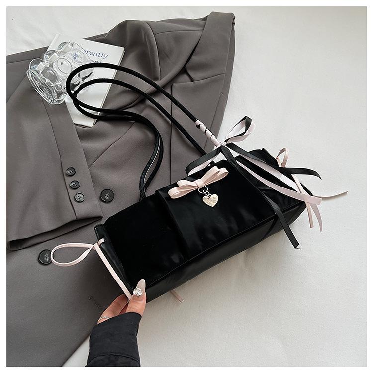 

Korean version of foreign style bow underarm small bag women s 2025 new fashionable large-capacity baguette bag high-end shoulder bag чёрный