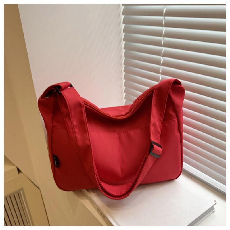 New casual messenger canvas bag, simple large-capacity shoulder bag, niche design sense, daily commuter bag