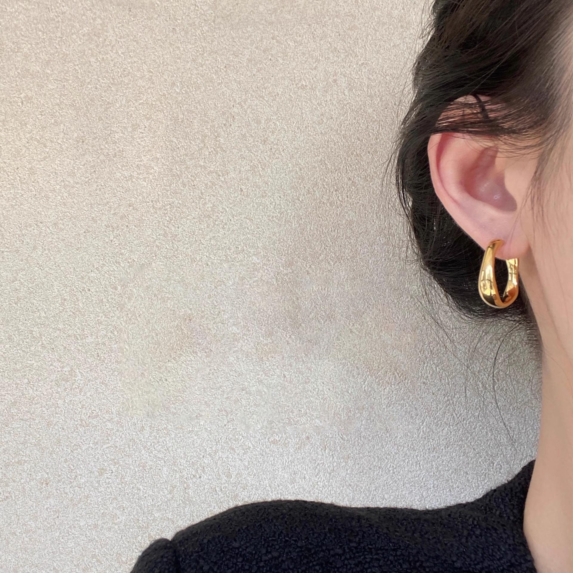 Cold wind irregular plain ring earrings women s simple niche design sense metal stud earrings 925 silver needle earrings