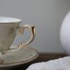 Filiżanka kawy koreański Retro kremowy żółty duszpasterski kwiatowy maswerk złoty ceramiczny angielski popołudniowy deser kwiatowa filiżanka do herbaty i spodek