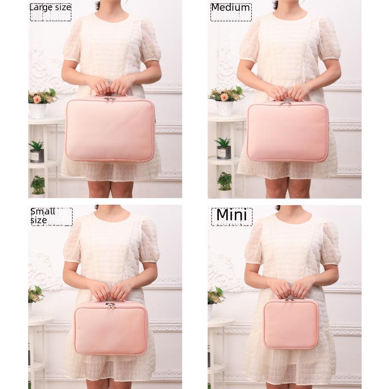 "Large Portable Pink Cosmetic Bag for Women - High-Capacity Makeup, Tattoo, and Nail Tool Storage"