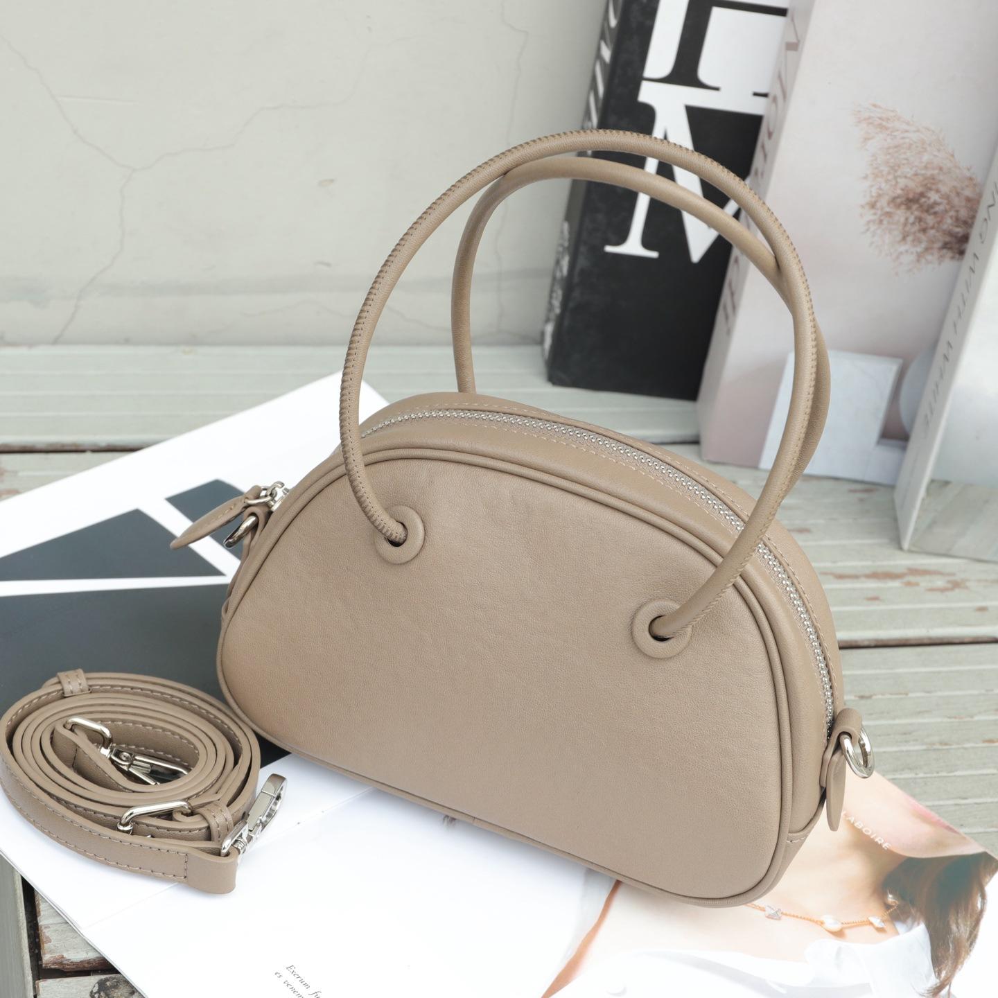 

Genuine Leather Simple Large Capacity Hundred-match Handbag High-grade Sense Women s Minority Design Fashion Single Shoulder Bag Underarm Bag 21x8x14cm светло-серый