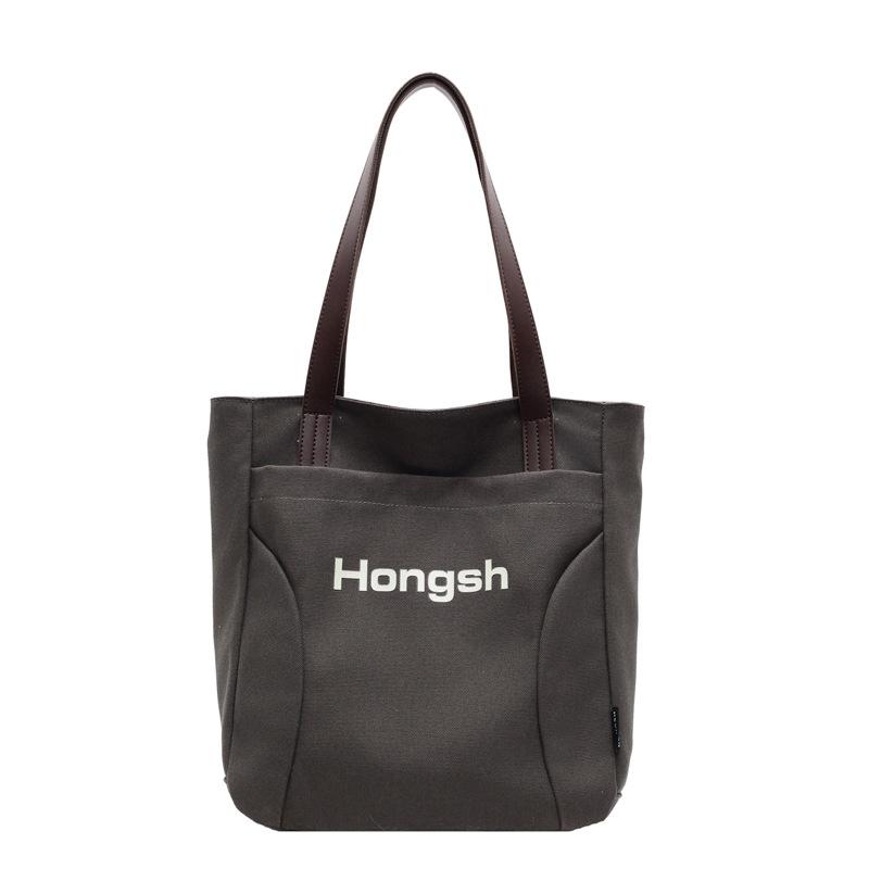 

High-end large-capacity canvas bag 2025 new fashion commuting oversized shopping bag hand-to-shoulder tote women s bag 38*34*15