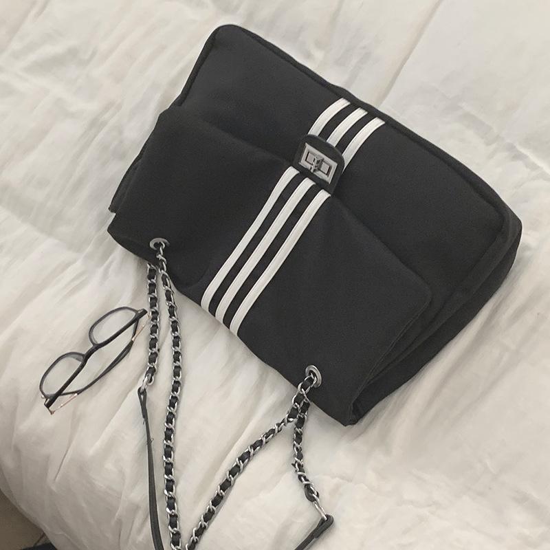 

Casual canvas bag women s new trendy chain tote bag large capacity messenger bag stray bag чорний