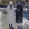 Piumino lungo in cotone autunno e inverno da donna con cappotto in cotone tinta unita al ginocchio ispessito
