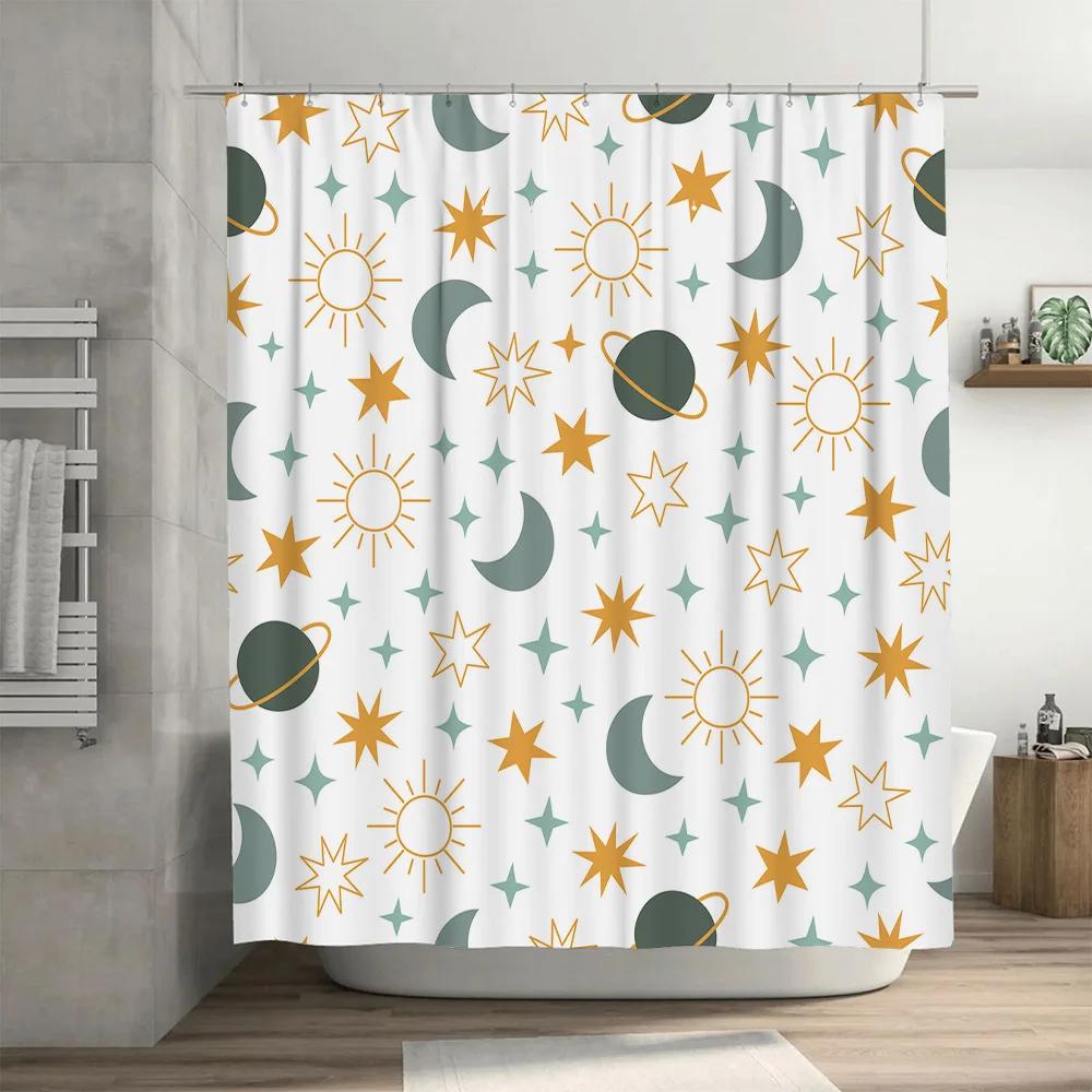 Space-themed shower curtain with celestial pattern featuring suns, moons, stars, and planets in green, blue, and orange colors