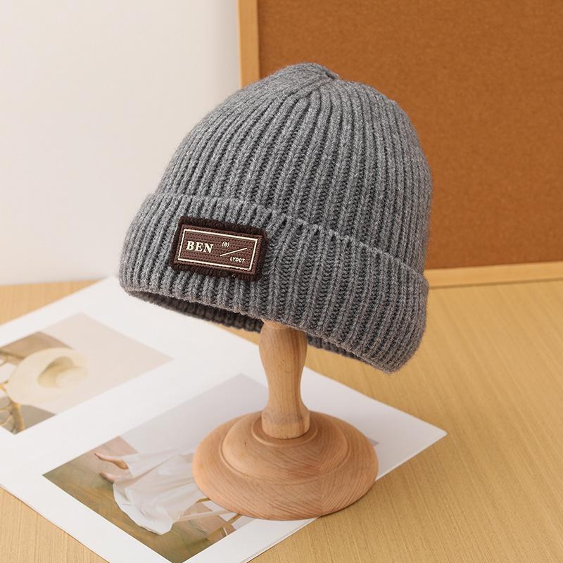 

Korean style Autumn and Winter Labeled Woolen Hats Children s Padded and Thickened Warm Knitted Hats Versatile and Fashionable Cold Hats one size