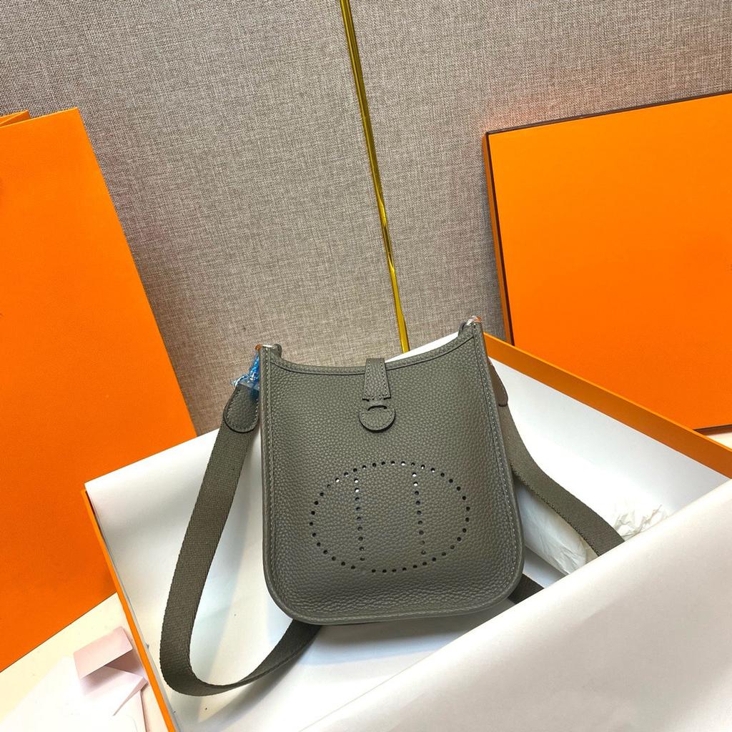 Factory wholesale first layer togo cowhide bucket bag women's bag lychee pattern hollow single shoulder crossbody bag hollow design