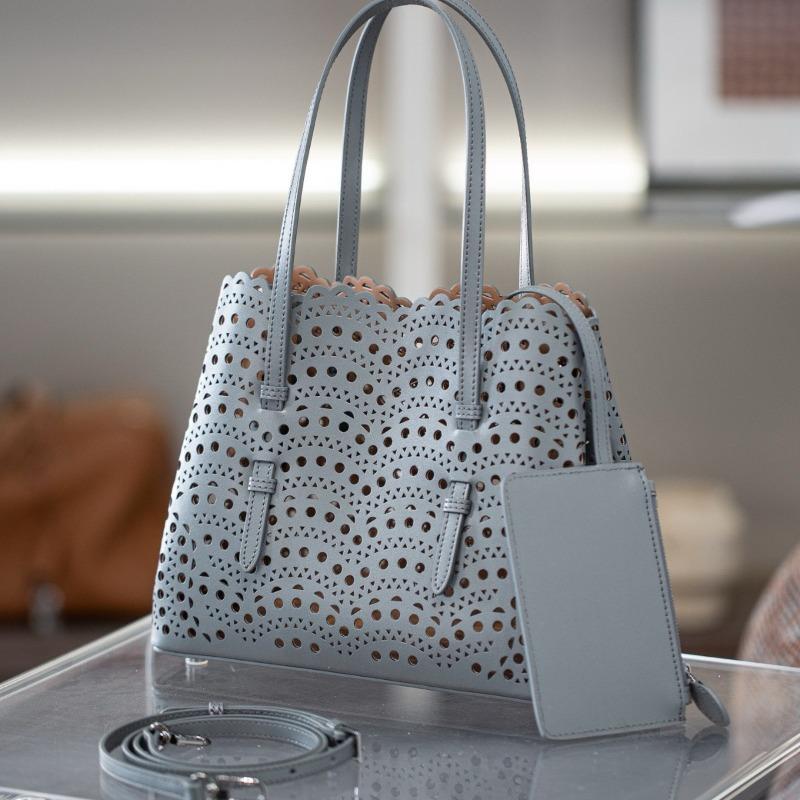 Design di nicchia nuova borsa a tracolla in pelle intagliata borsa a cesto vegetale vuota a spalla nella borsa da donna borsa a tracolla in pelle di mucca