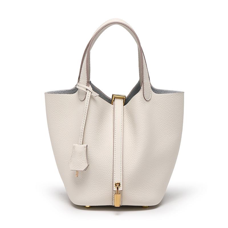 

Bag new vegetable basket women s bag first layer cowhide bucket bag niche fashionable versatile leather women s bag молоко, білий колір